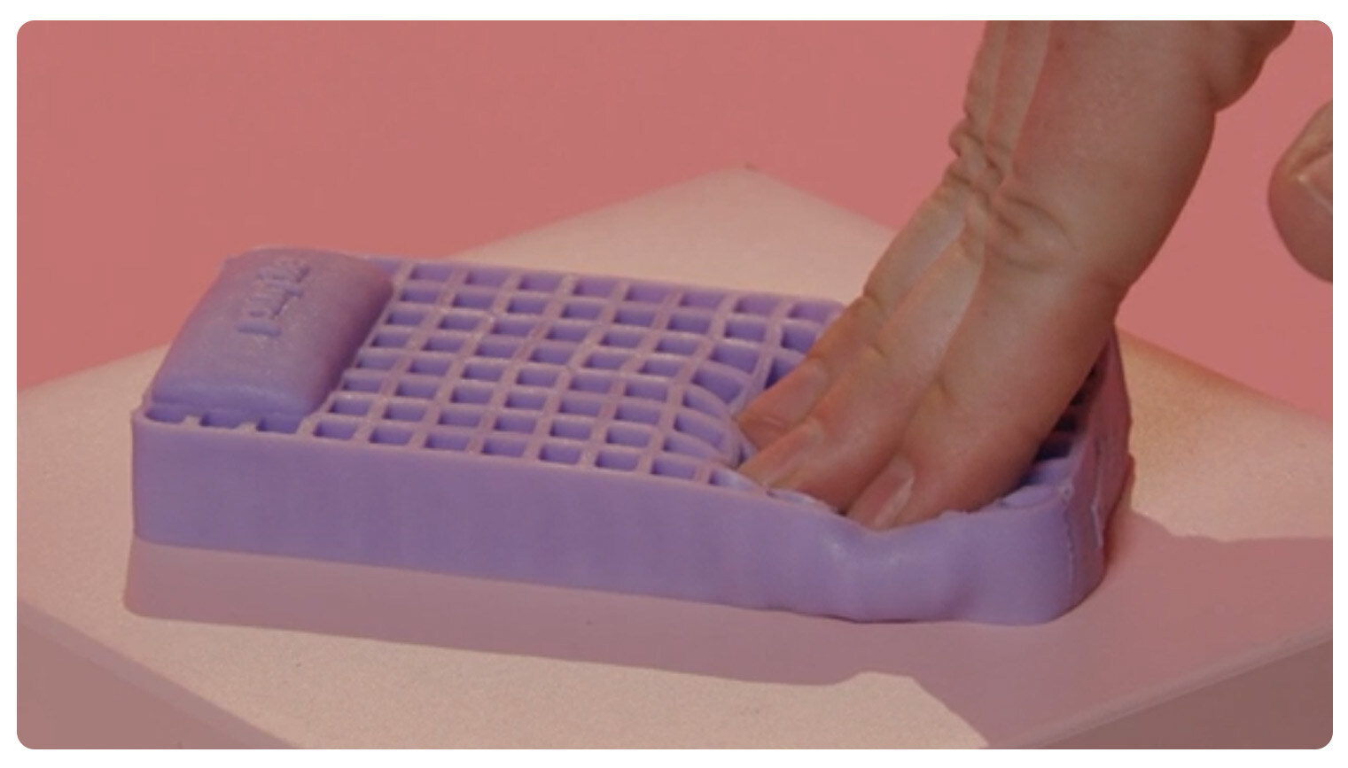Purple Squishy mattress frame from advertisement campaign video