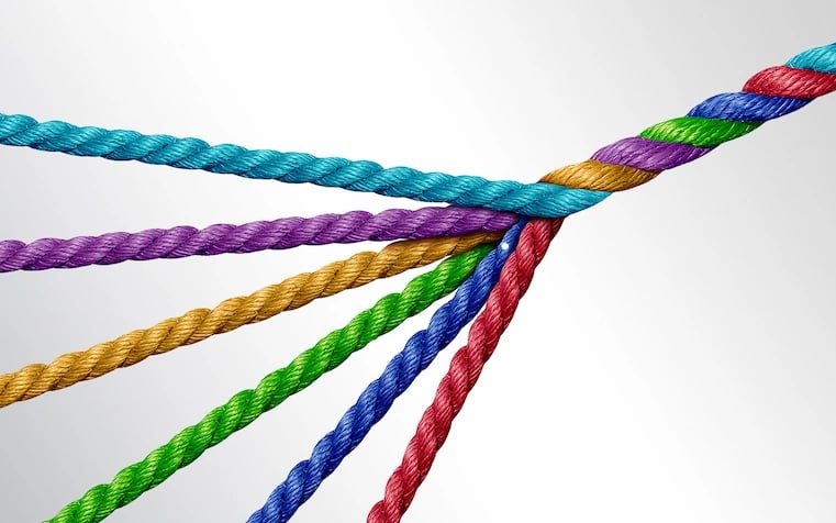 weave of threads coming together in a line