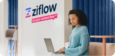 Ziflow office employee working with a laptop